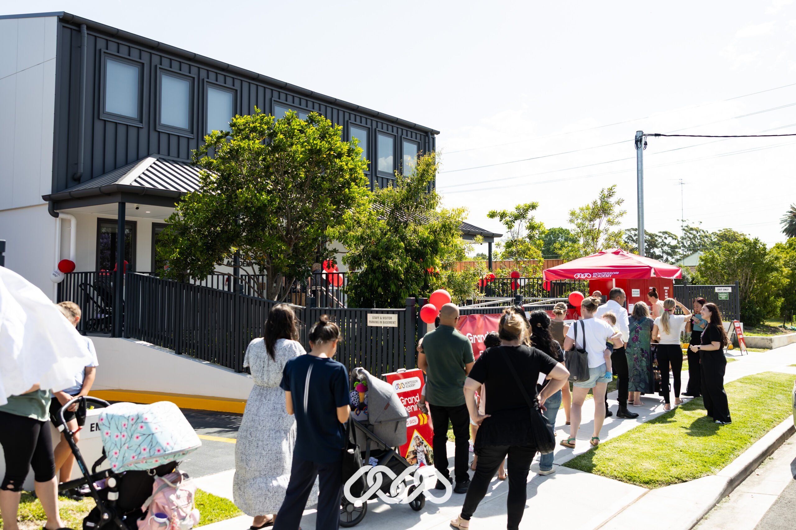 Families lining up to enter the Penrith Derby Street grand opening event outside the centre.